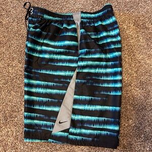 Nike Men’s XXL Swim Trunks, has a smalll flaw under the drawstring